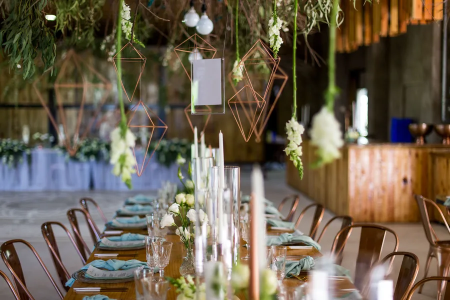 Styled event table with hanging florals